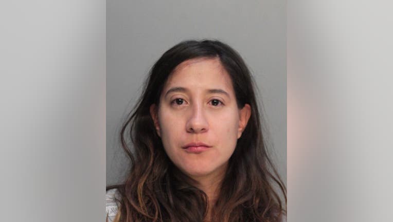 Esperanza Gomez, 33, faces assault and domestic violence charges. (Miami Dade County Corrections and Rehabilitation)