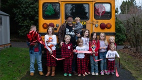 'Grandfather Express': Man surprises grandchildren with bus to take them to school each morning