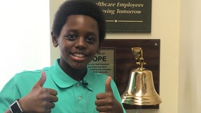 ‘Stay happy, stay strong’: Inspirational 11-year-old rings cancer-free bell in time for the holidays