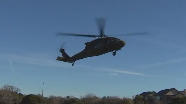 Bowie HS students get up close look at Black Hawk helicopter