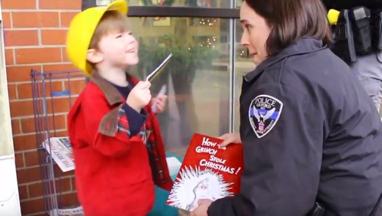 Police Officer Rachel Ratcliffe set up a Christmas caper for her 3-year-old neighbor to investigate this Christmas. The Oxford Police Department made a video of the investigation, and Bailey saved Christmas!