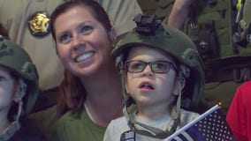 Georgetown boy at center of dismissed swing set lawsuit becomes honorary Wilco deputy, SWAT team member