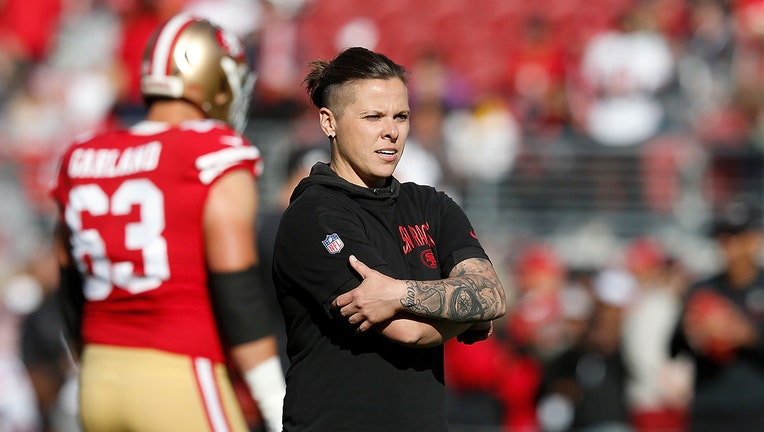 SANTA CLARA, CALIFORNIA - DECEMBER 15: San Francisco 49ers offensive assistant coach Katie Sowers looks on during the warm up before the game against the Atlanta Falcons at Levi's Stadium on December 15, 2019 in Santa Clara, California.