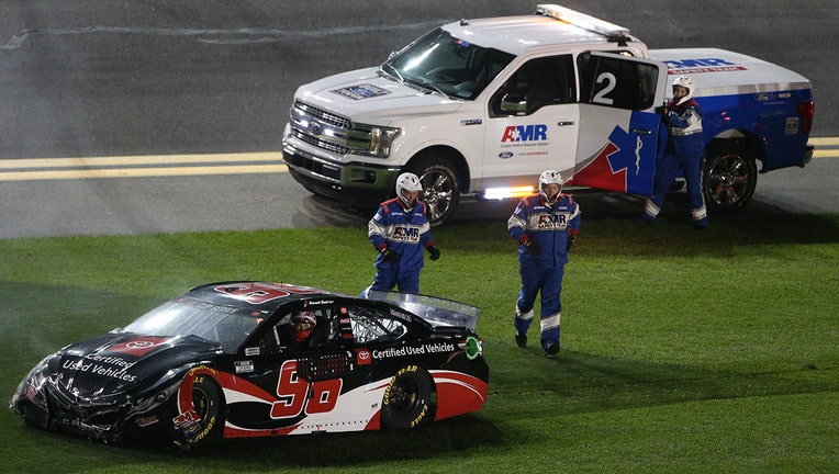 DAYTONA BEACH, FLORIDA - FEBRUARY 13: Daniel Suarez, driver of the #96 Toyota Certified Used Vehicles Toyota, crashes in the infield grass during the NASCAR Cup Series Bluegreen Vacations Duel 1 at Daytona International Speedway on February 13, 2020 in Daytona Beach, Florida. (Photo by Brian Lawdermilk/Getty Images)