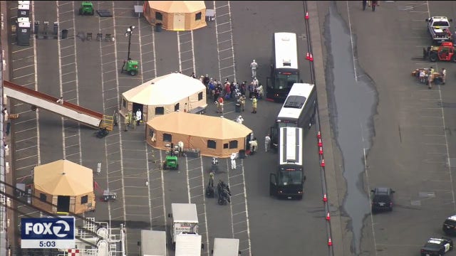 Cruise passengers say Travis AFB 'vast improvement' from being held at sea