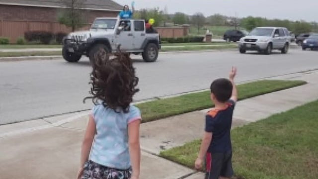Pflugerville ISD teachers parade to see students during school closures due to COVID-19