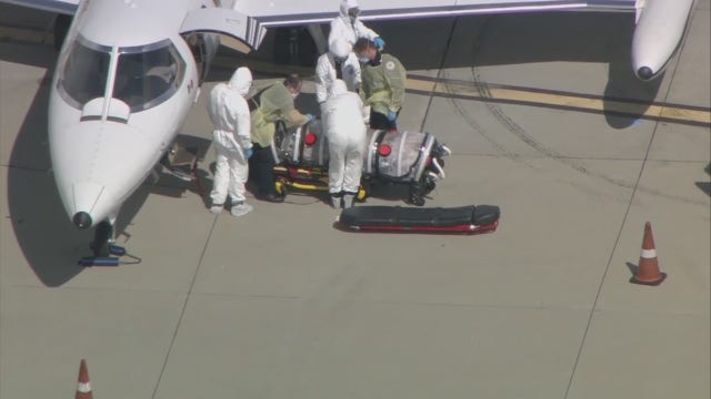 COVID-19 patient arrives at LAX in negative pressure isolation chamber