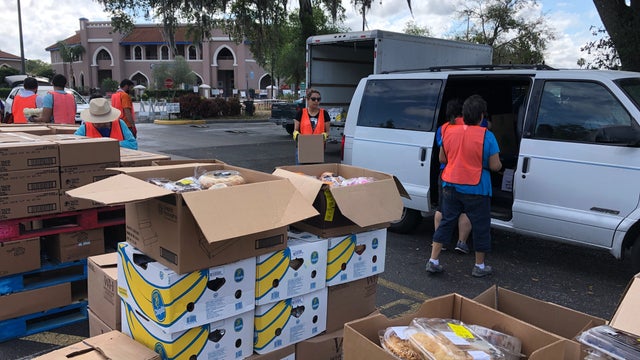 Hundreds line up at Central Florida food bank after coronavirus leaves them in a pinch
