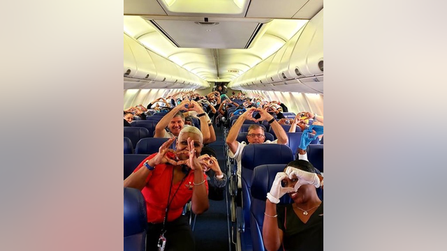 Viral photos show health care workers on plane, en route to New York to help in coronavirus fight
