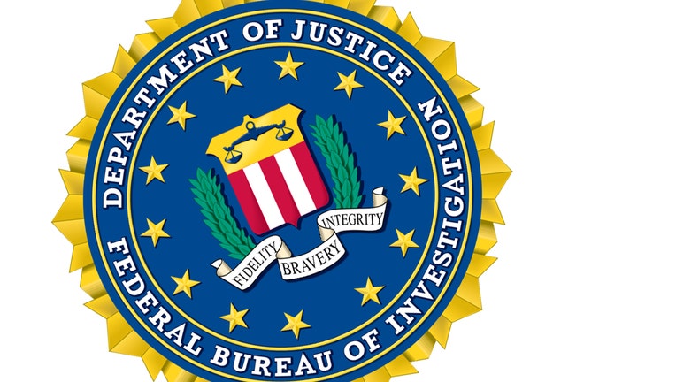 117a8553-FBI-Federal_Bureau_of_Investigation-seal_1542319823687-402429.jpg