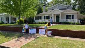 'Thank you' signs line Marietta street near hospital