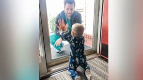 Doctor and son in viral photo lose home in tornado