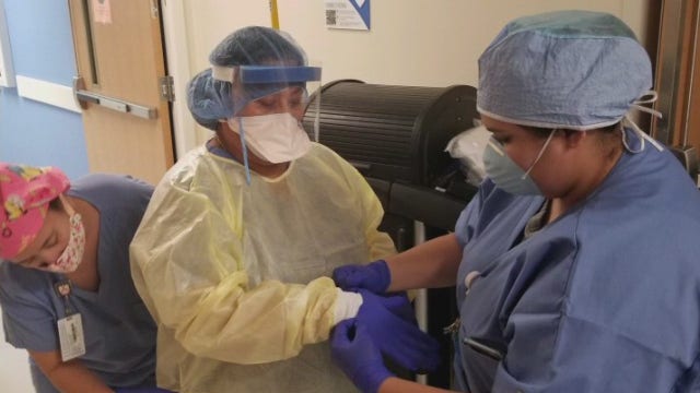 ICU nurse at Dell Seton shares her experience of treating and comforting COVID-19 patients