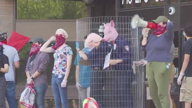 Protesters gather outside APD headquarters, demand justice for man shot by police