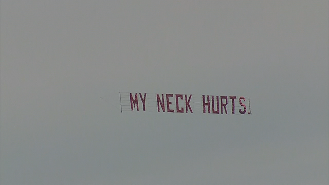 Plane with 'My Neck Hurts' banner flies over Dallas during George Floyd protest