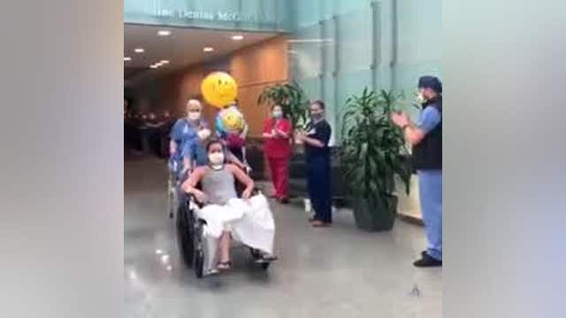 Austin mother holds baby for the first time after recovering from COVID-19