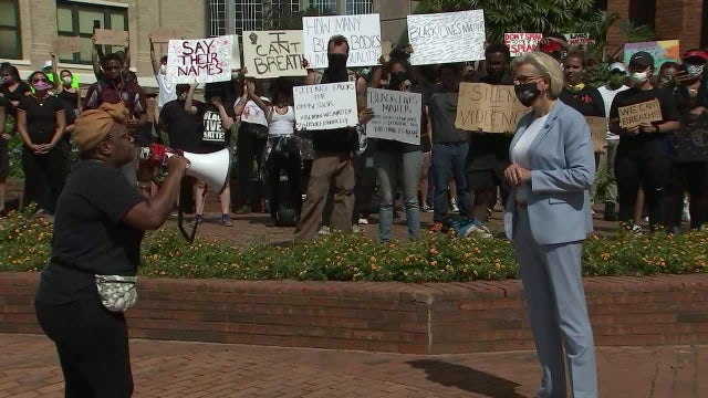 With shouts of 'Go home Jane,' Tampa protesters refuse meeting with mayor