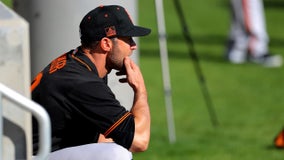 San Francisco Giants manager Gabe Kapler, players kneel during anthem