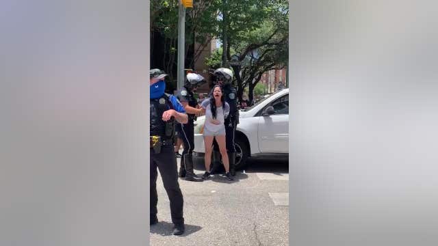 APD defends frisking of woman after arrest video goes viral