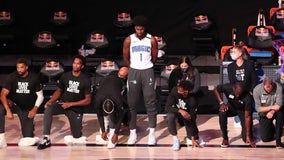 Orlando Magic player stands for national anthem as teammates, opponents kneel