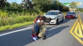 Florida deputies stage fake traffic stop to surprise kids with military mom's homecoming