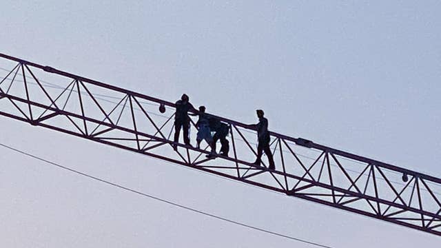 Person rescued after getting stuck on crane in Downtown Austin