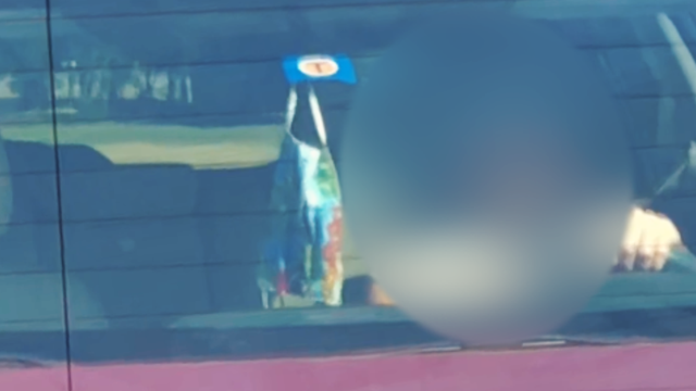 Hanging facemasks on rearview mirror is a safety hazard, AAA Texas warns