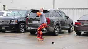 Dad dances in hospital parking lot to lift son's spirits during cancer treatment