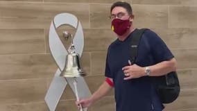 Washington Football Team Coach Ron Rivera rings bell after final cancer treatment