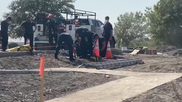 Construction worker dies after falling into open manhole