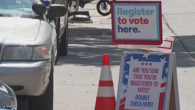 Drive-thru voter registration held in Downtown Austin
