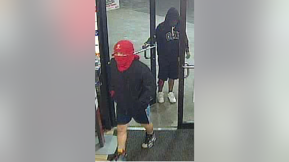 The suspects entered a convenience store armed with multiple handguns, assaulted the clerk, and stole money and other items.