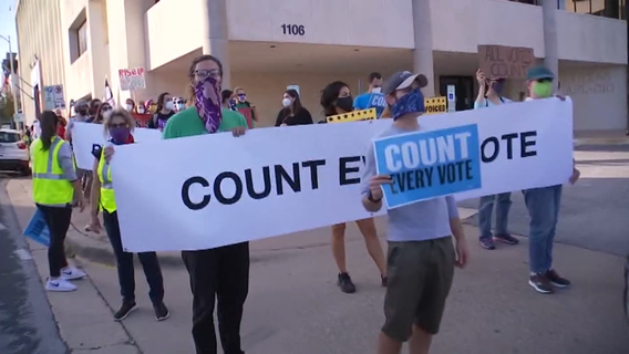 Austinites take to the streets downtown as wait for election results continues