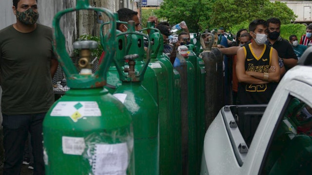 COVID-19 variant found in Brazil, South Africa could pose higher reinfection risk, study suggests