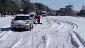 Crews work to plow and maintain roads after rare Texas snow storm