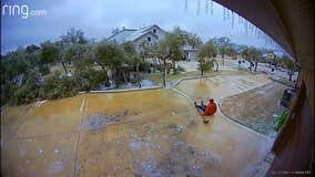 Man slips down icy driveway after winter storm hits Austin area