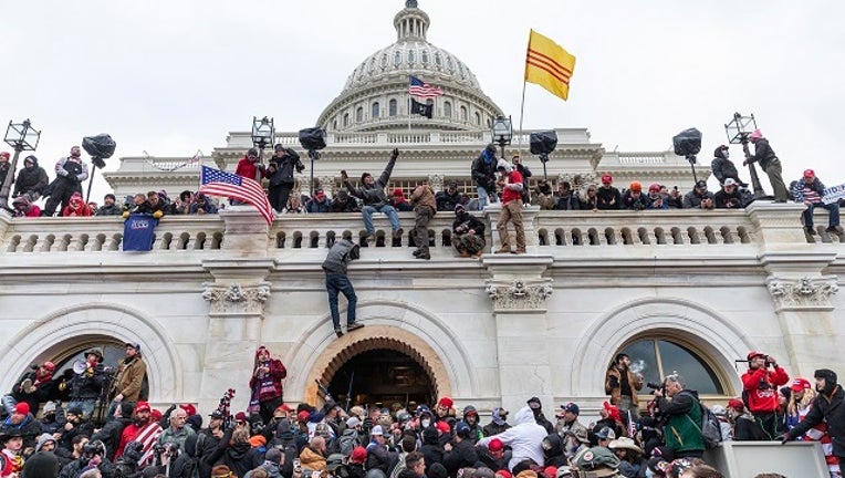 Protesters seen all over Capitol building where pro-Trump