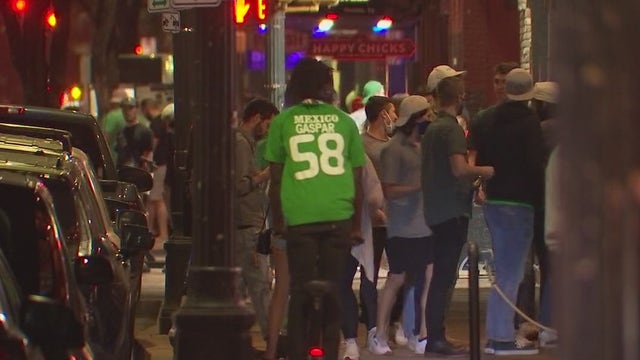 People in Austin celebrate St. Patrick’s Day with, without masks