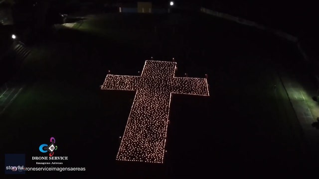 More than 1,000 candles form cross to remember COVID-19 victims in Brazil