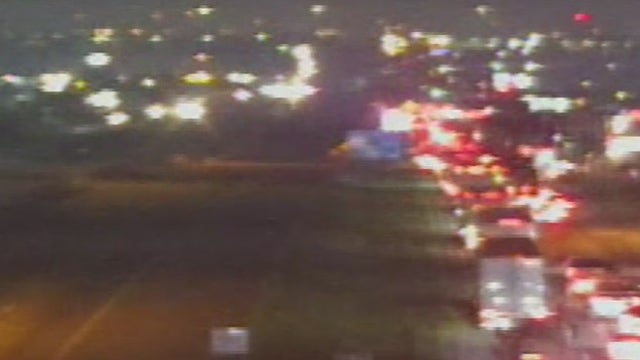 Downed power line causes long delays on I-35