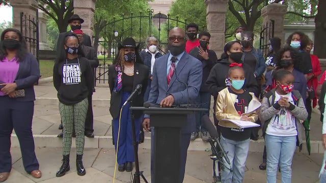 Local groups hold rally expressing opposition to voting bill