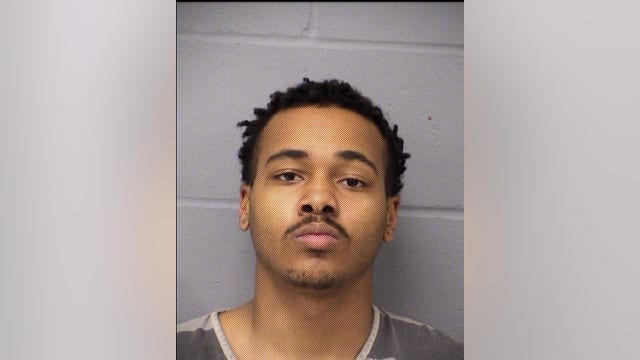 Man arrested for pointing gun, miming shooting two APD officers
