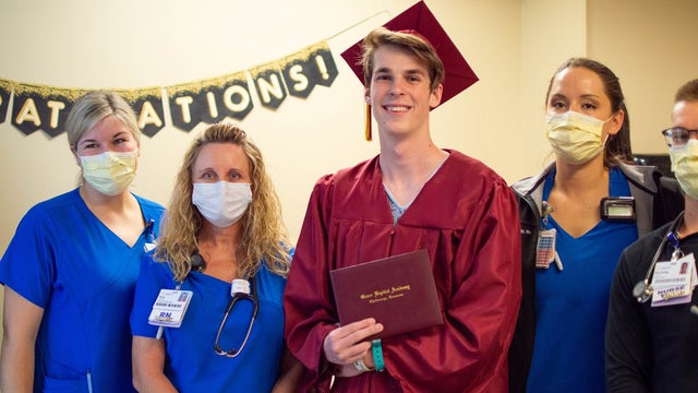 Tennessee hospital stages graduation for senior who couldn't attend his school's ceremony