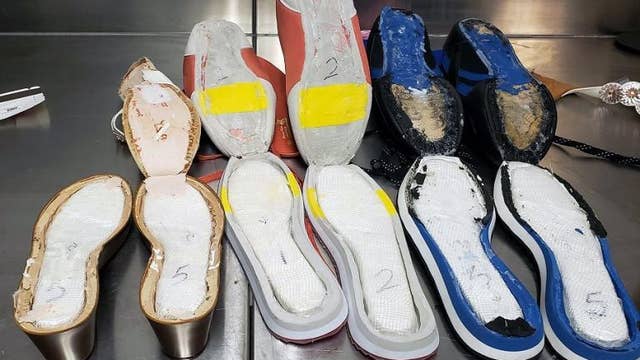 Woman caught at Atlanta airport smuggling cocaine in shoes, officials say