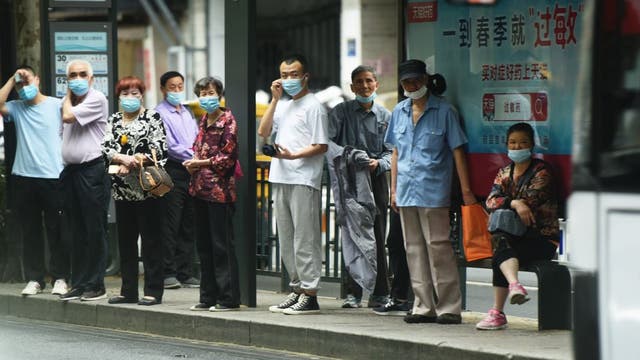 China records slowest population growth in decades, census data shows