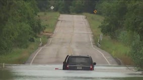 Driver stuck at low water crossing rescued by helicopter