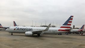 Group refusing to wear masks leads to 24-hour delay of American Airlines flight