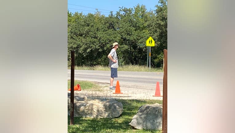 The suspect is believed to be a white male, approximately 6 foot tall, 175 pounds, with short hair, possibly wearing a face mask, shorts, and a boonie-style hat, according to the sheriff's office.