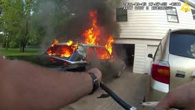 Bodycam video: Deputy pulls burning car away from home in Chisago County