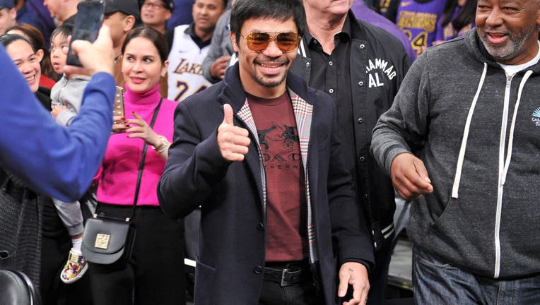 fcf59e53-Celebrities At The Los Angeles Lakers Game